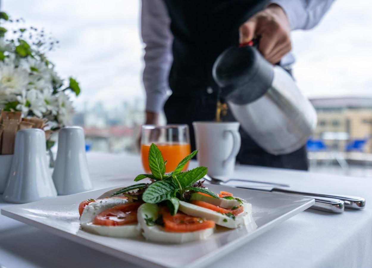 Point Hotel Taksim Istanbul Exterior photo A waiter serving breakfast